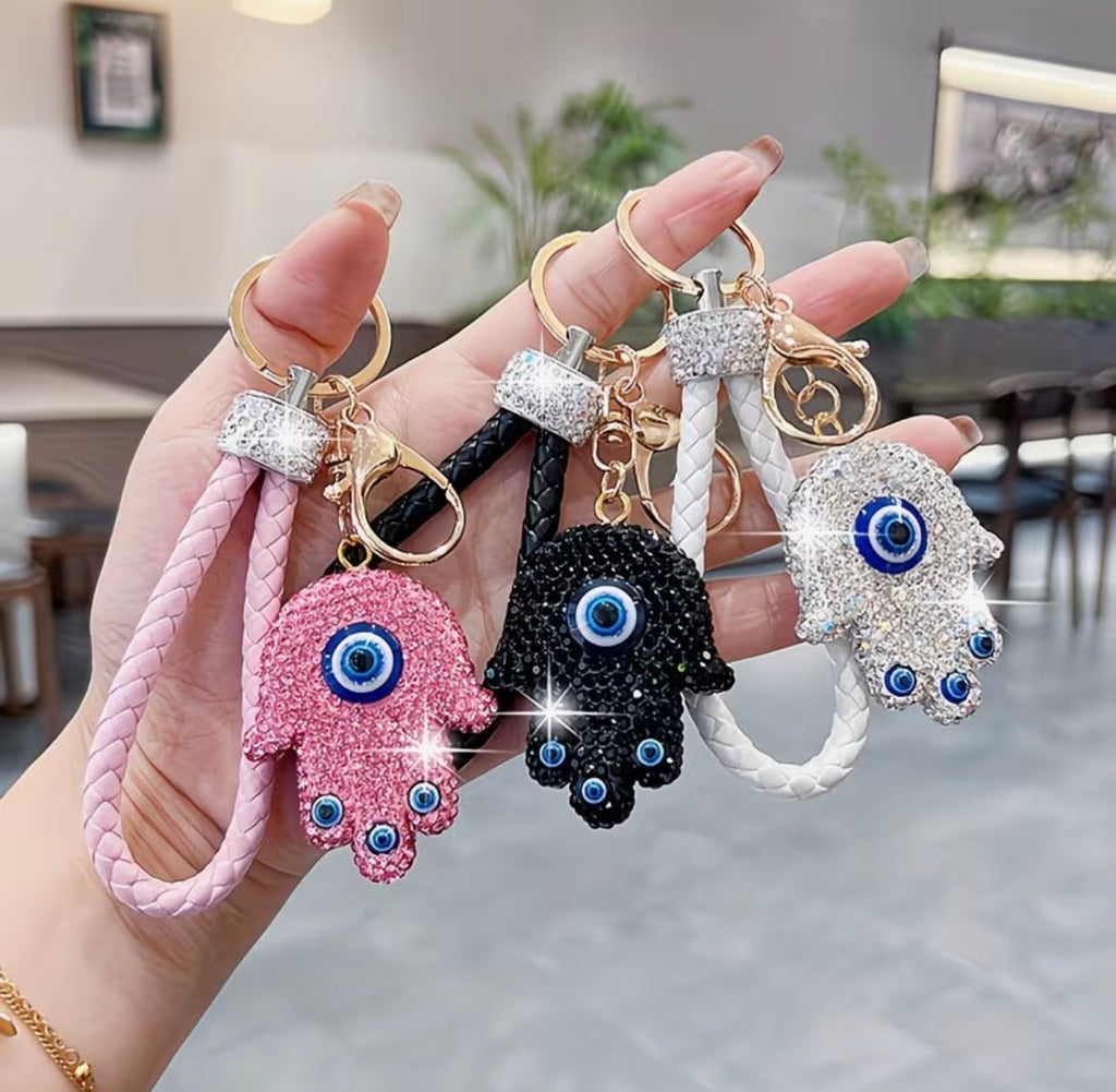 WARMINGO DE Evil Eye Hamsa Hand Keychain | Rhinestone Lucky Charm Key Ring with Braided Leather Strap | Women's Day Gift | Protection Amulet Accessory | Bag Charm Hanging