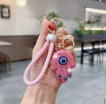 WARMINGO DE Evil Eye Hamsa Hand Keychain | Rhinestone Lucky Charm Key Ring with Braided Leather Strap | Women's Day Gift | Protection Amulet Accessory | Bag Charm Hanging