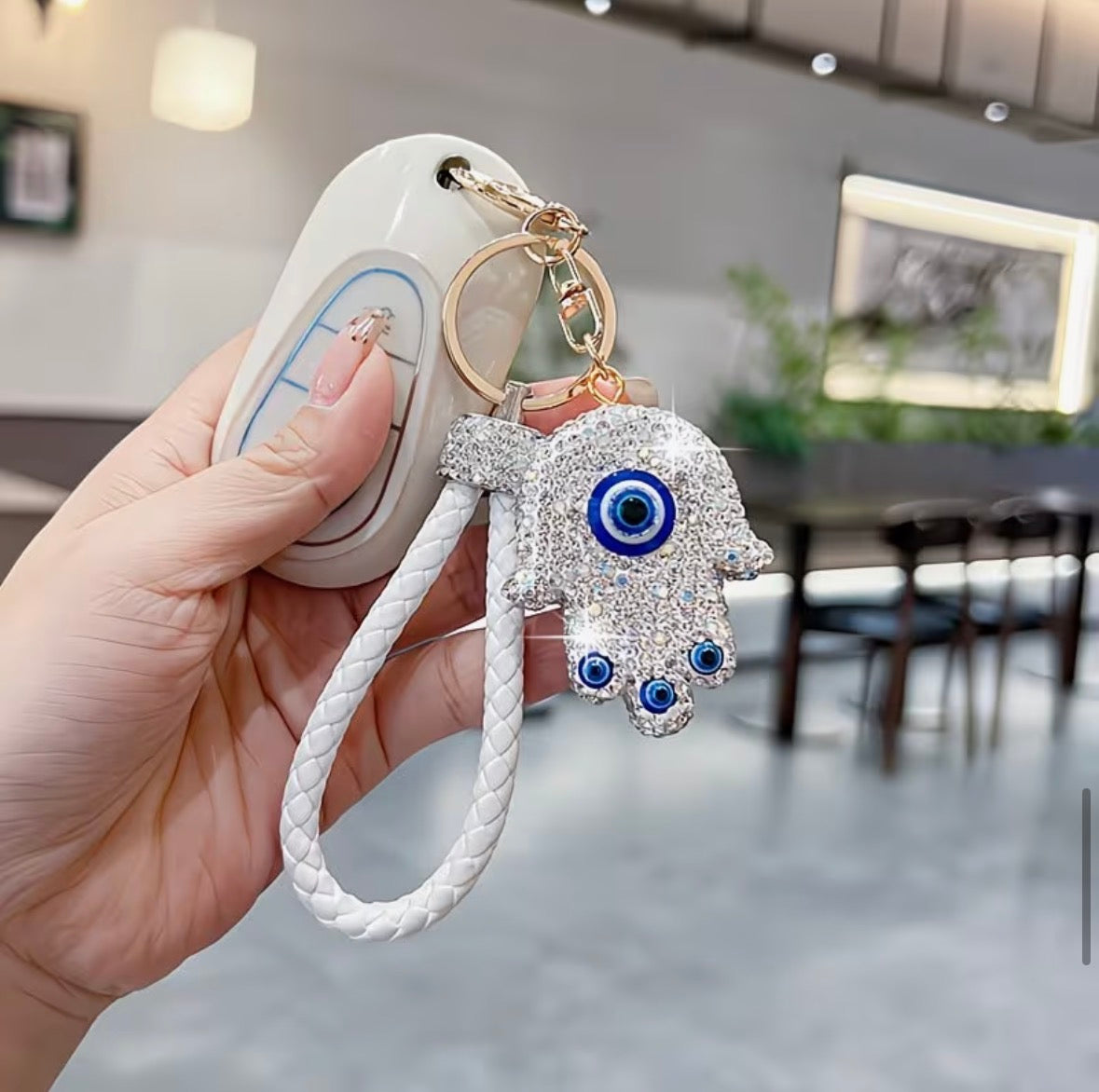 WARMINGO DE Evil Eye Hamsa Hand Keychain | Rhinestone Lucky Charm Key Ring with Braided Leather Strap | Women's Day Gift | Protection Amulet Accessory | Bag Charm Hanging