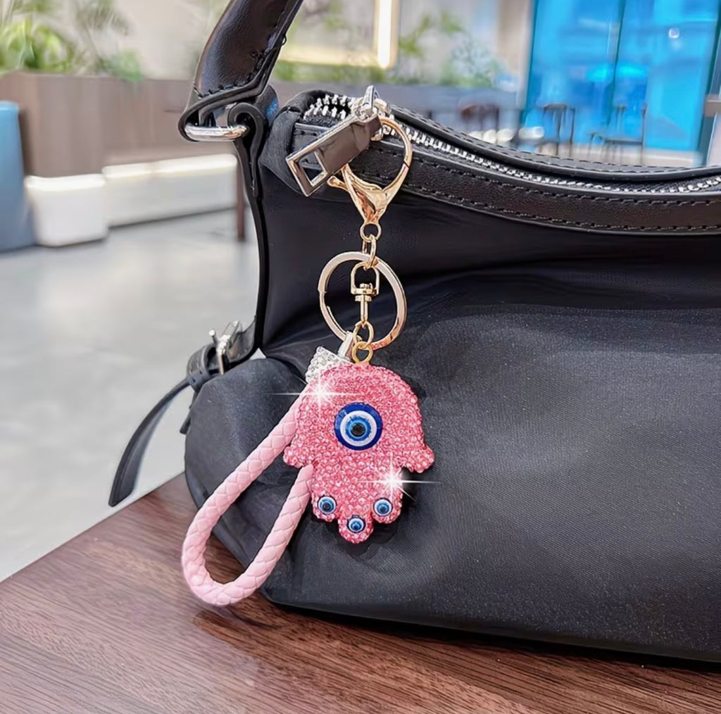 WARMINGO DE Evil Eye Hamsa Hand Keychain | Rhinestone Lucky Charm Key Ring with Braided Leather Strap | Women's Day Gift | Protection Amulet Accessory | Bag Charm Hanging